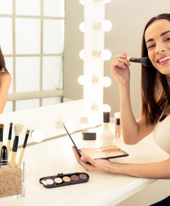 Model with Gold Makeup Brush Holder